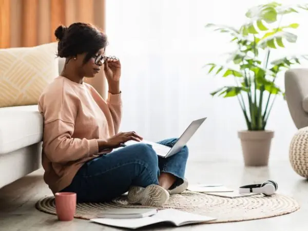 Woman in glasses on her laptop