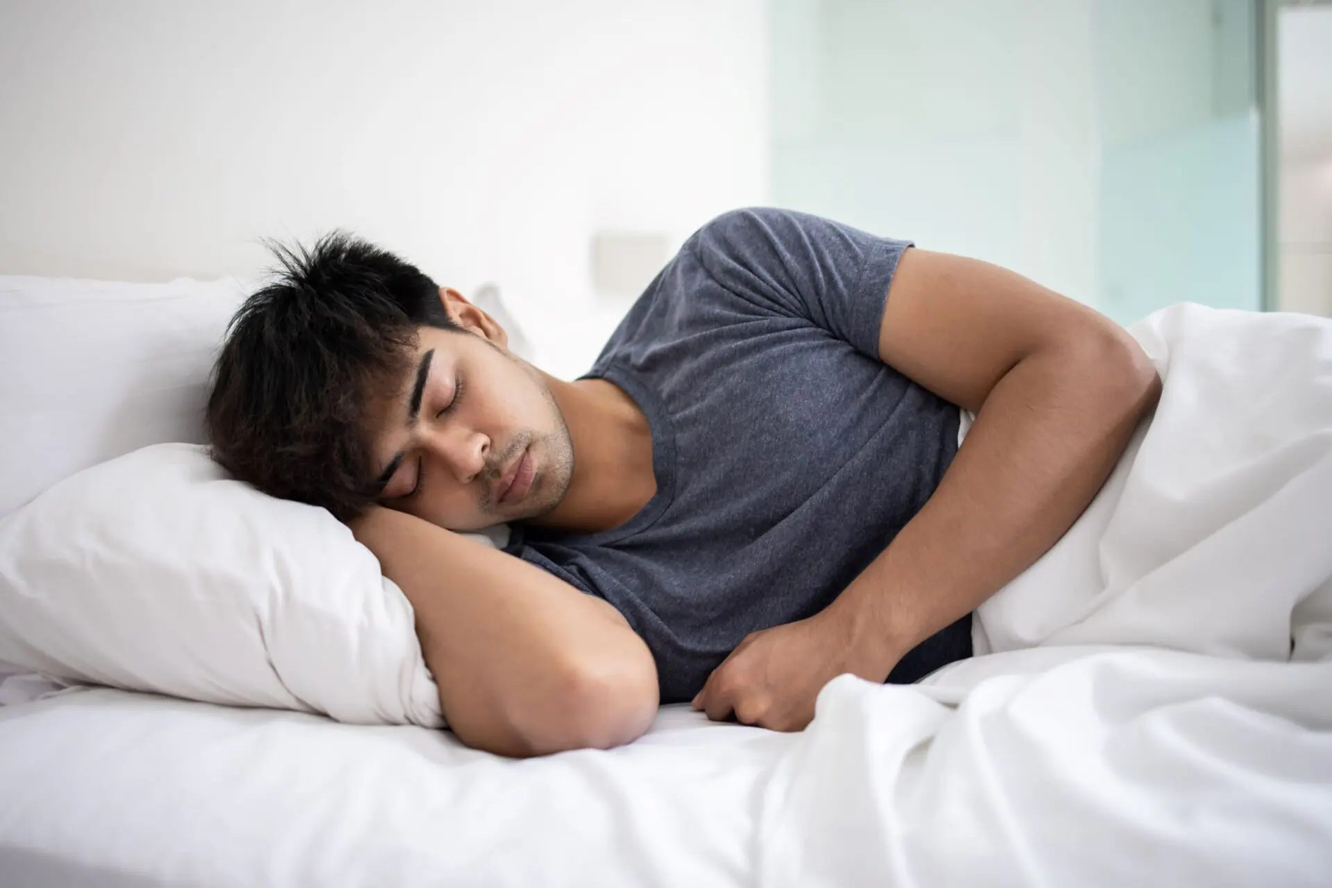 man sleeping on his side