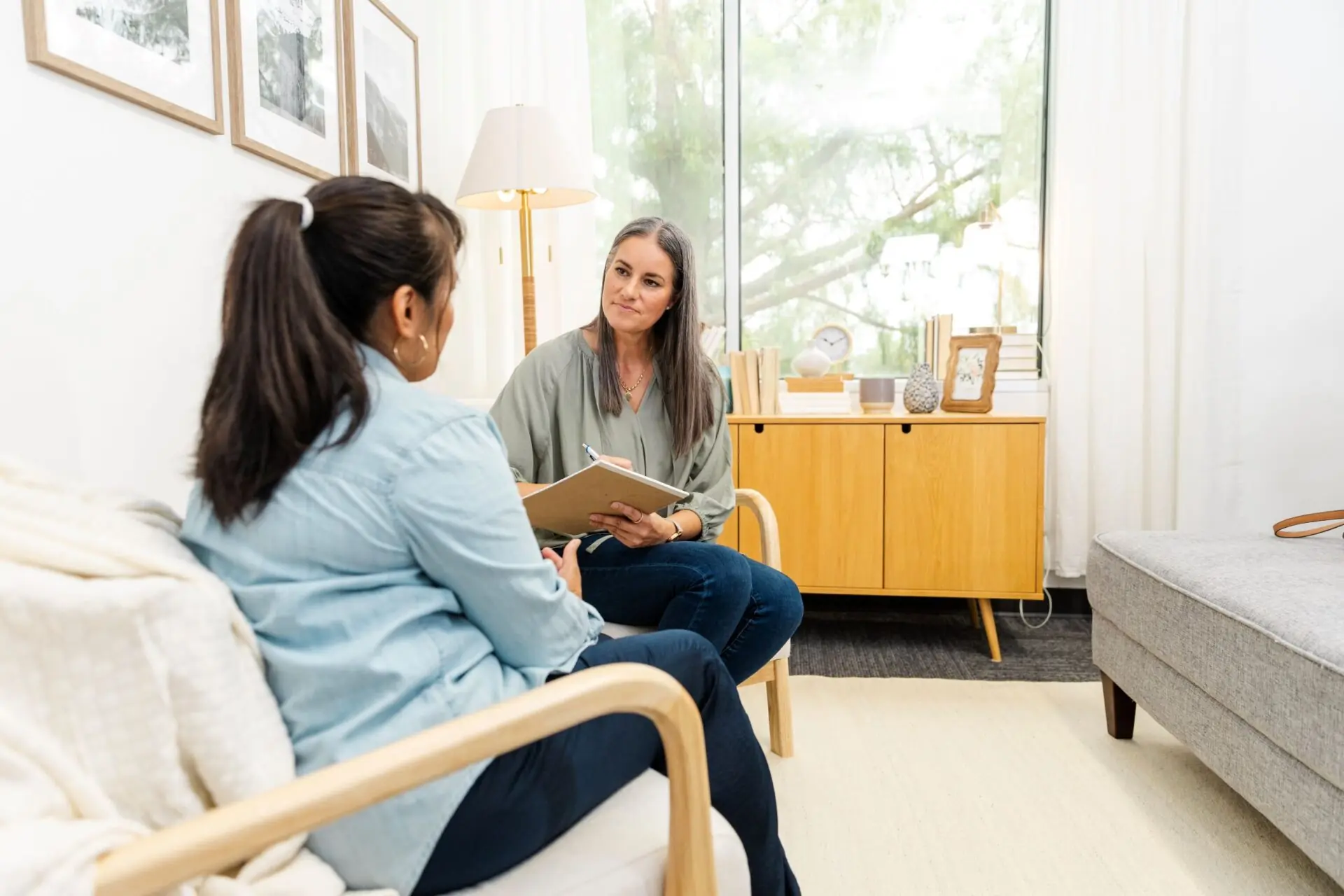 woman talking to female counselor