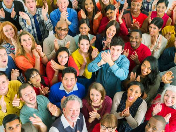 Large group of people in colorful outfits