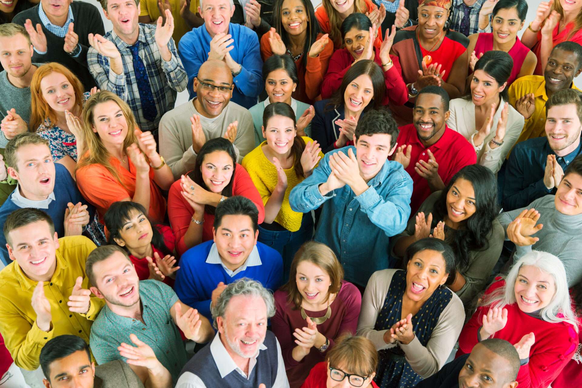 Large group of people in colorful outfits