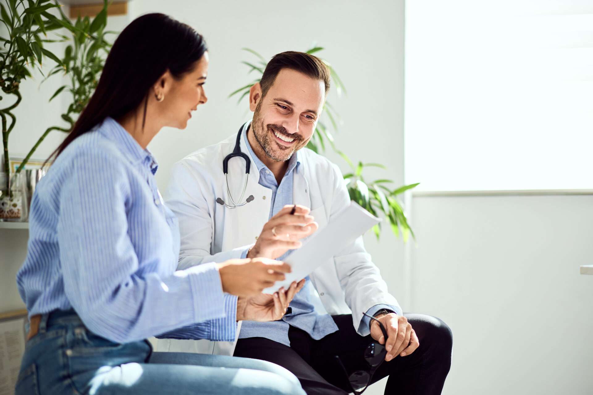 male doctor sharing results with patient