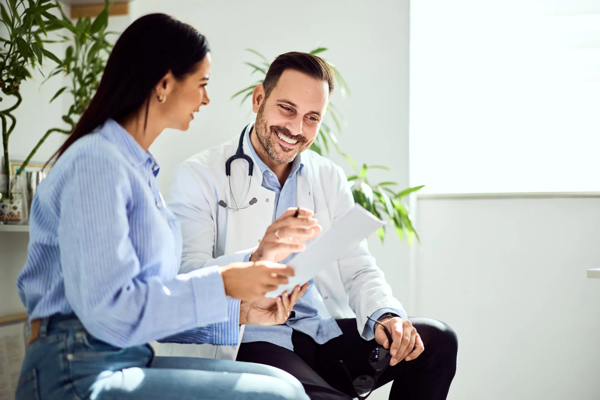 male doctor sharing results with patient