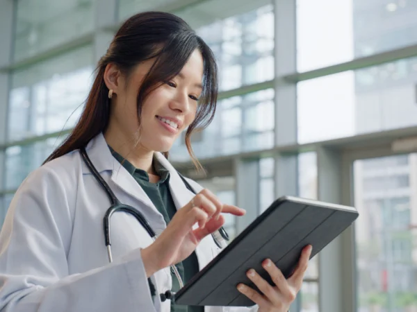 Doctor using tablet in hospital
