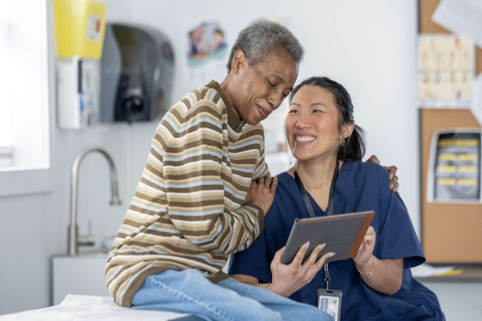 Doctor comforting a patient