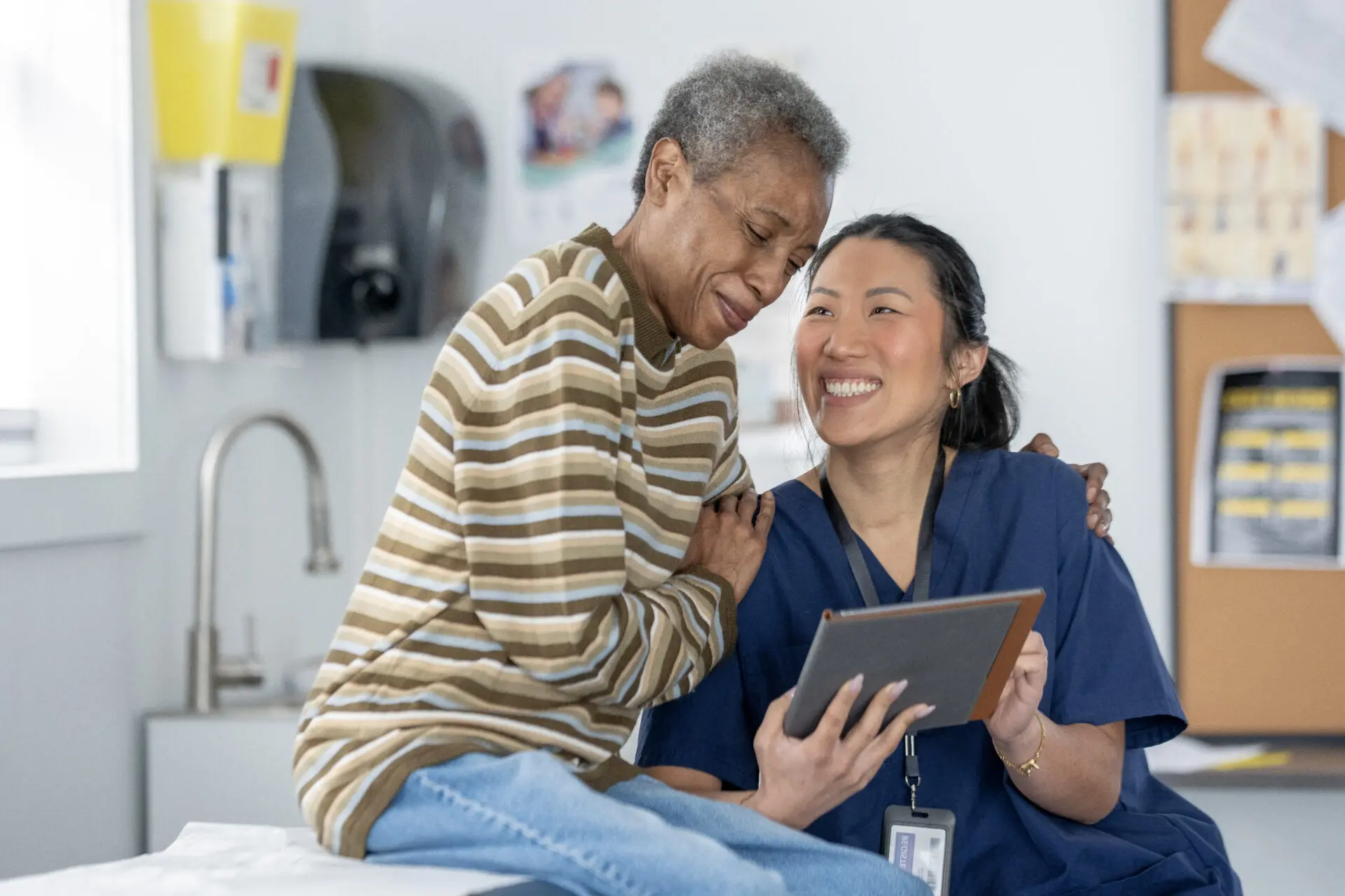Doctor comforting a patient